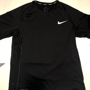 Never worn Nike pro combat, dri-fit tee shirt